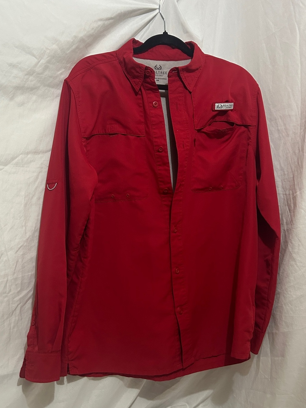 Realtree Fishing Men's Long Sleeve Button Up Performance Shirt in Brick Red.